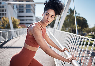 Buy stock photo Black woman, fitness and stretching, running in city and exercise outdoor, focus and strong with muscle training. Runner, athlete and sport motivation, person on bridge for run and health wellness