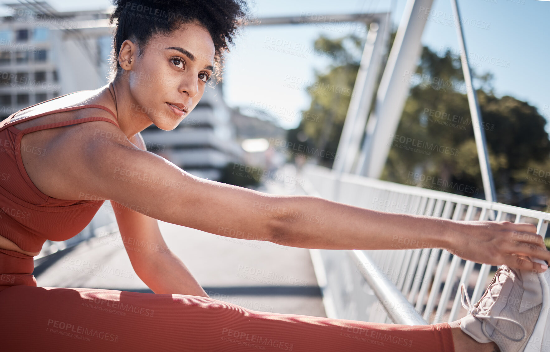 Buy stock photo Stretching legs, sports and woman on bridge for exercise, running workout or training in sports motivation, focus and thinking. Warm up, goals and urban athlete in city for pilates, muscle and health