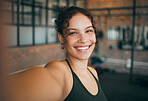 Fitness, exercise and gym selfie portrait of a woman happy about workout, training motivation and body wellness. Young sports female or athlete with a smile for blog inspiration and progress post