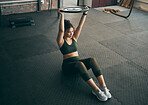 Exercise, weight plate and woman at gym for workout, fitness and training for health and body wellness. Strong sports female or bodybuilder on floor doing weightlifting for power, energy and balance
