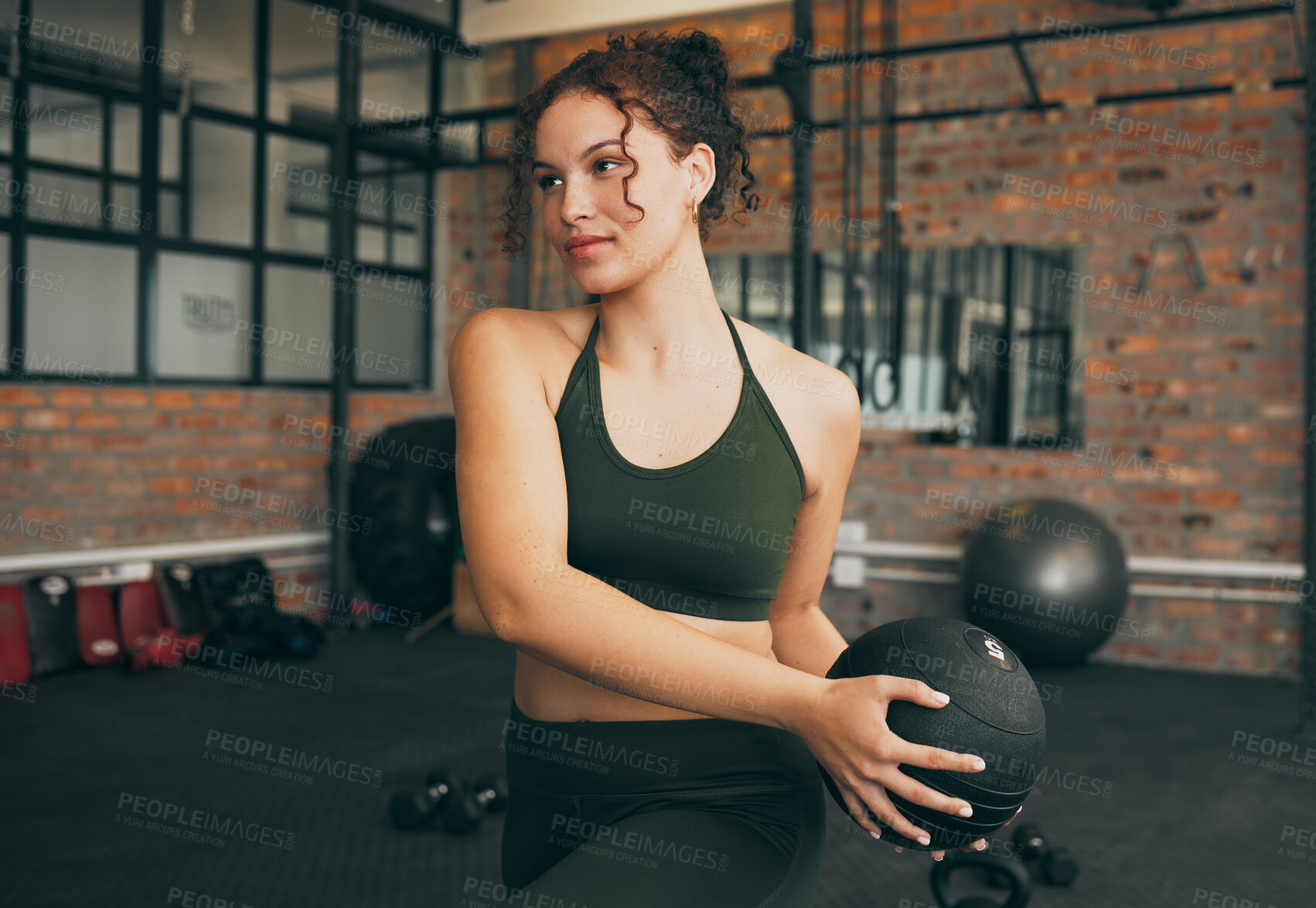 Buy stock photo Fitness, medicine ball and exercise of a woman at gym doing weight training for body wellness, health and energy. Sports female with equipment for strong muscle power, balance and healthy lifestyle
