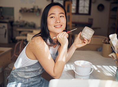 Buy stock photo Woman, potter or thinking of product design ideas, cup painting vision or creative color in Asian pottery studio. Smile, happy or clay store worker and mug goals, small business or ceramic workshop