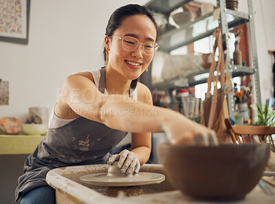 Buy stock photo Happy, pottery or woman in designer workshop working on cup sculpture or mug mold in small business. Smile, artistic girl or creative Japanese worker busy with handicraft products as entrepreneur 