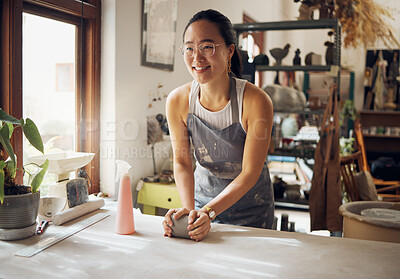 Buy stock photo Asian, woman and artist in clay studio, workshop and creative startup to sculpture product. Ceramic designer, creative pottery process and production, manufacturing and creativity in small business