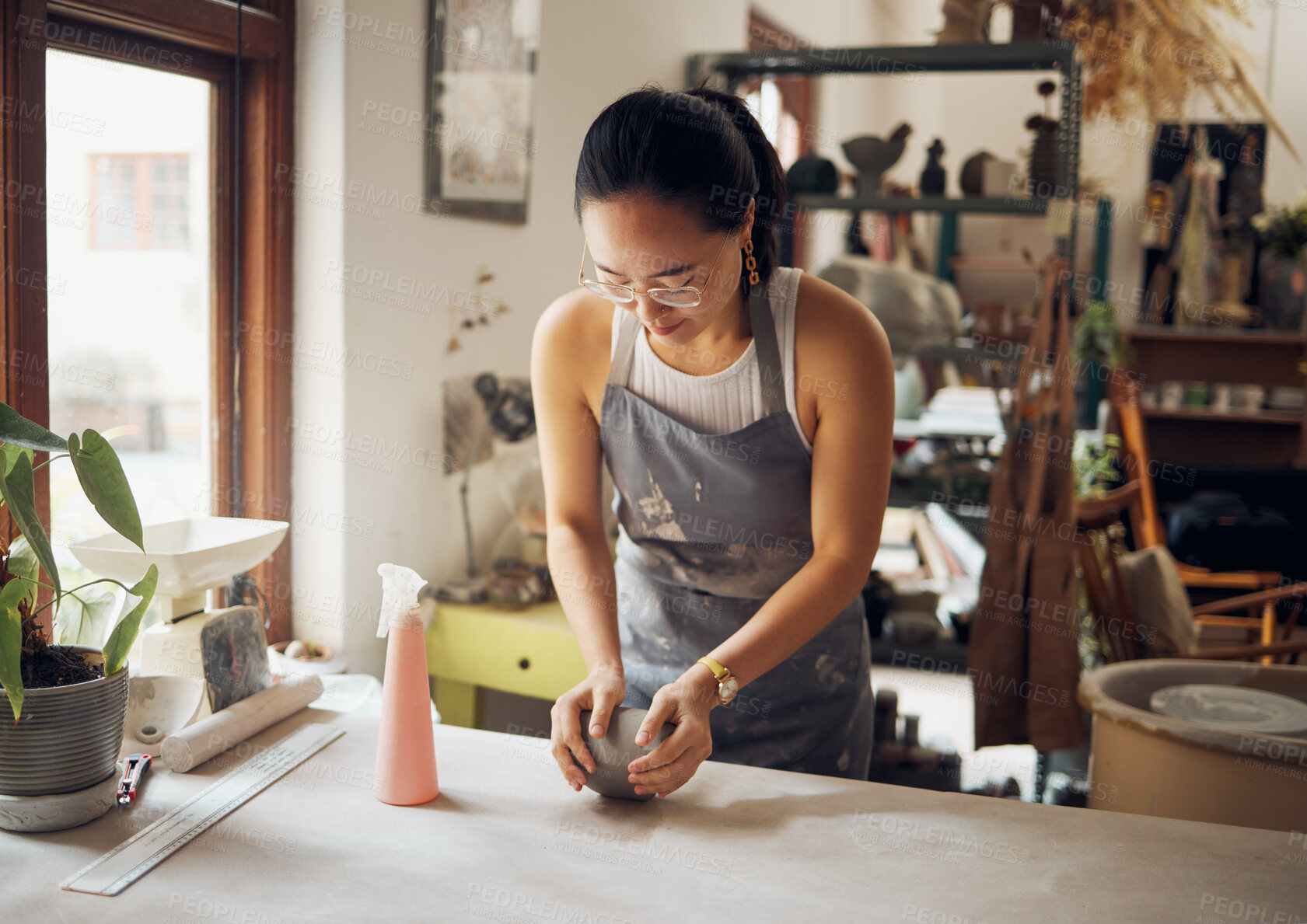 Buy stock photo Design, sculpt and pottery business woman with clay for creativity, inspiration and art process in workshop. Creative, small business and asian girl working at artistic workspace in Tokyo, Japan

