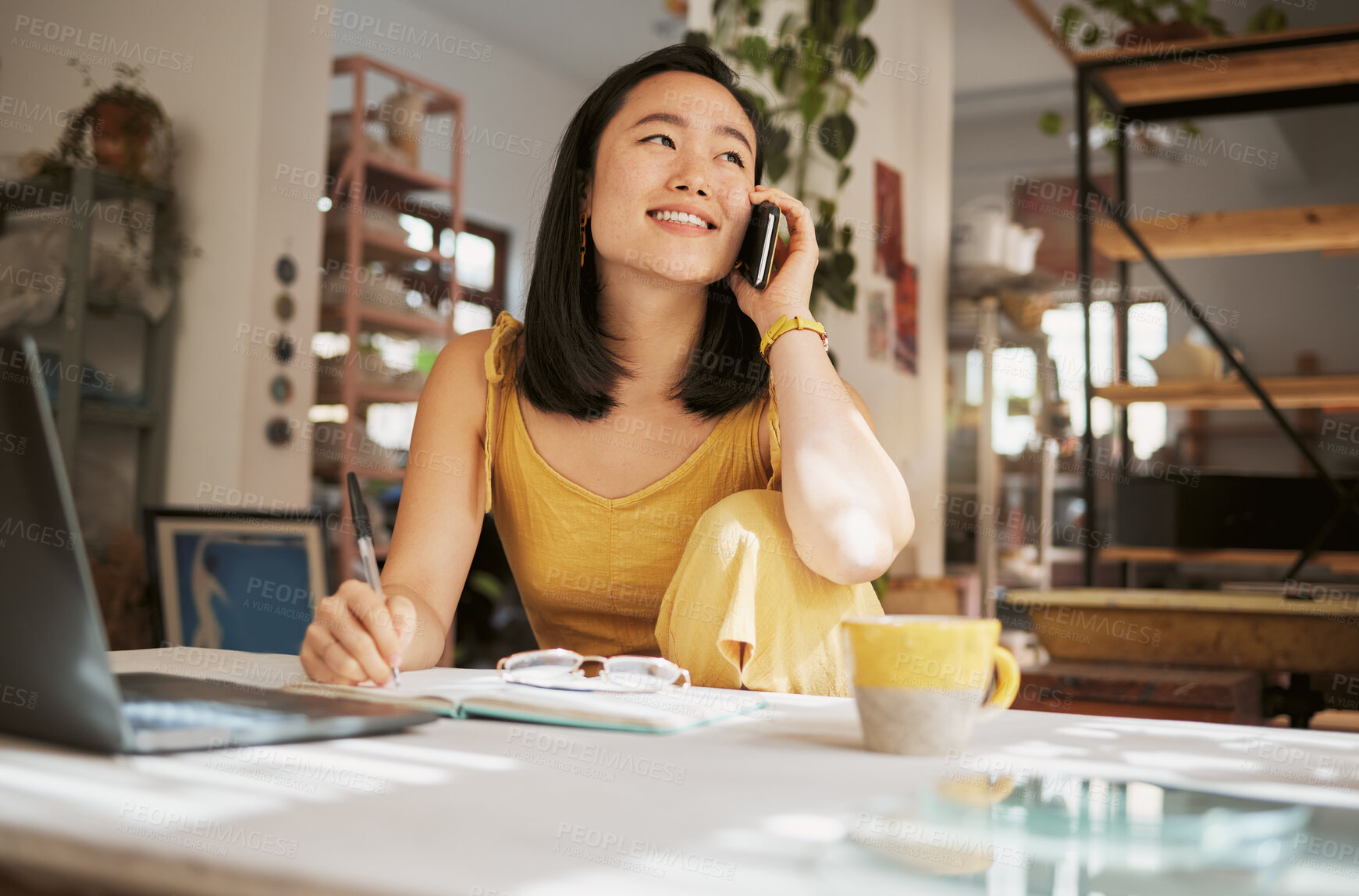 Buy stock photo Notebook, creative startup and Asian woman on a phone call for planning, conversation and talking to client. Communication, networking and girl with smartphone, laptop and ideas for art business