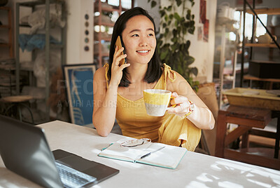 Buy stock photo Phone call, coffee and Asian woman for creative startup in planning, online conversation and talking to client. Communication, network and girl with laptop, smartphone and notebook for art business