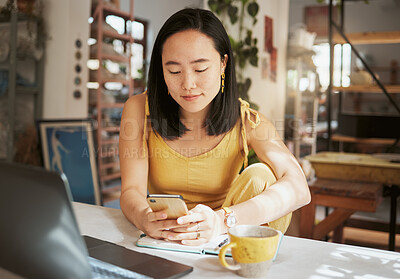 Buy stock photo Asian woman, cafe and smartphone for connection, remote work and lady with online research, chatting and comfortable. Female, creative and freelancer in coffee shop, relax and texting for project