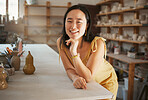 Asian woman, smile portrait and ceramic art studio for product manufacturing workshop, sculpture artist and creativity retail store. Pottery, artistic woman business and creative artwork happiness