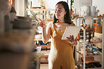 Kitchen stock check, woman and tablet data of a entrepreneur checking store information. Happy, smile and startup professional busy working on a ingredient inventory search for accounting audit