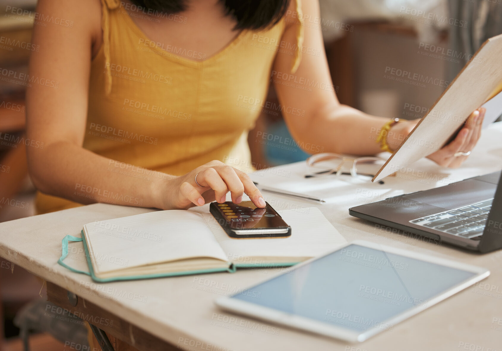 Buy stock photo Notes, business woman and phone with hands or computer work of an remote employee typing. Online planning, internet research and pc writing of a female freelancer on a mobile checking staff numbers