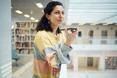 Buy stock photo Phone, library and research with a woman recording a voice note while in a bookstore for education. Mobile, communication and books with a female student in a bookshop for data or information