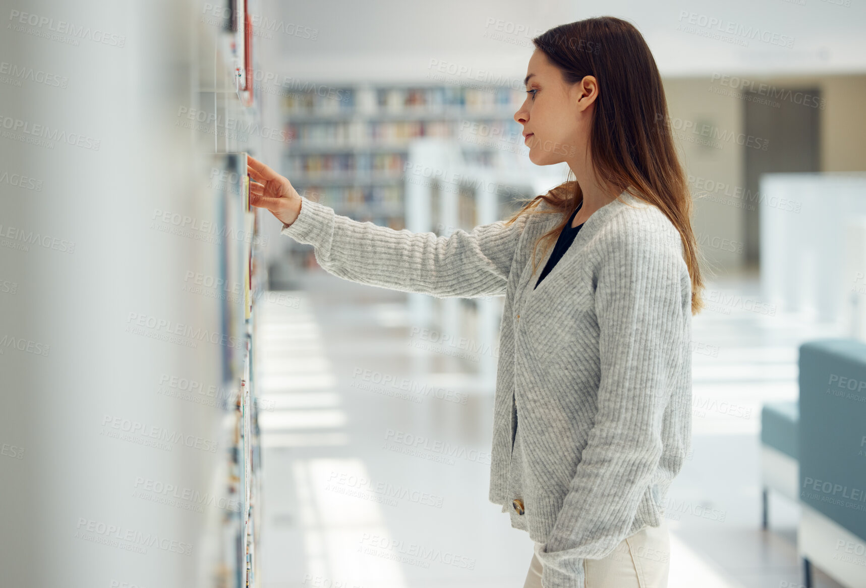 Buy stock photo Woman, student and decision in library for book knowledge or learning at the university for education. Female looking at bookshelf in study, choice or assignment project for college scholarship