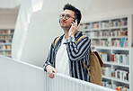 Phone call, college student man and university library work of a education tutor ready for learning. School campus building, wifi calling and communication of a person online looking for study books