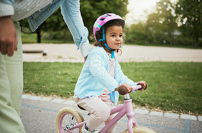 Buy stock photo Mother, girl and learning with bike in street, road or park for love, bonding and happy on holiday. Mom, kid and teaching, cycling and bicycle on adventure, outdoor or neighborhood for development