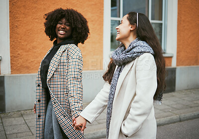 Buy stock photo Love, holding hands and lesbian couple walking in street enjoying holiday, vacation and adventure on weekend. Fashion, lgbtq relationship and women together for happy lifestyle, freedom and relaxing