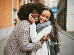 Fashion, city and friends hug in street enjoying holiday, vacation and adventure together on weekend. Friendship, travel and couple of happy women hugging for carefree lifestyle, freedom and relaxing