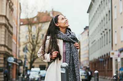 Buy stock photo Walking, city buildings and woman travel on urban street, road or on holiday adventure journey In Chicago Illinois. Outdoor wanderlust, sidewalk and girl on tour journey of USA for winter vacation