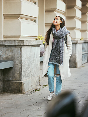 Buy stock photo Woman, walking or sightseeing city buildings in road, street or New York in morning commute, travel or holiday vacation. Smile, happy person and fashion tourist in warm and cool clothes on sidewalk