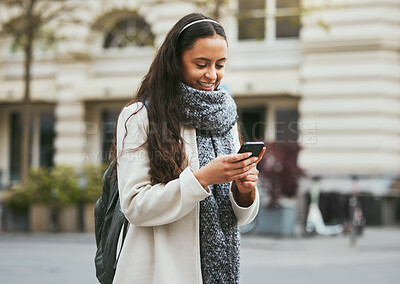 Buy stock photo Travel, walking and woman with phone in city in street, road and sidewalk in for urban adventure in London. Social media, freedom and girl using mobile app, digital map and internet on smartphone