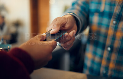 Buy stock photo Credit card payment, giving or customer hands, store cashier or restaurant waiter exchange gift card. B2c shopping service, sales or black man with financial debit card for fintech pay at retail cafe