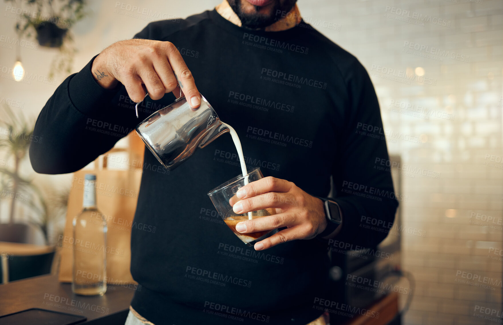 Buy stock photo Coffee, milk and hands of man in cafe for cappuccino, breakfast and caffeine beverage. Relax, espresso and dairy with barista in coffee shop and with latte for retail, mocha and drink preparation