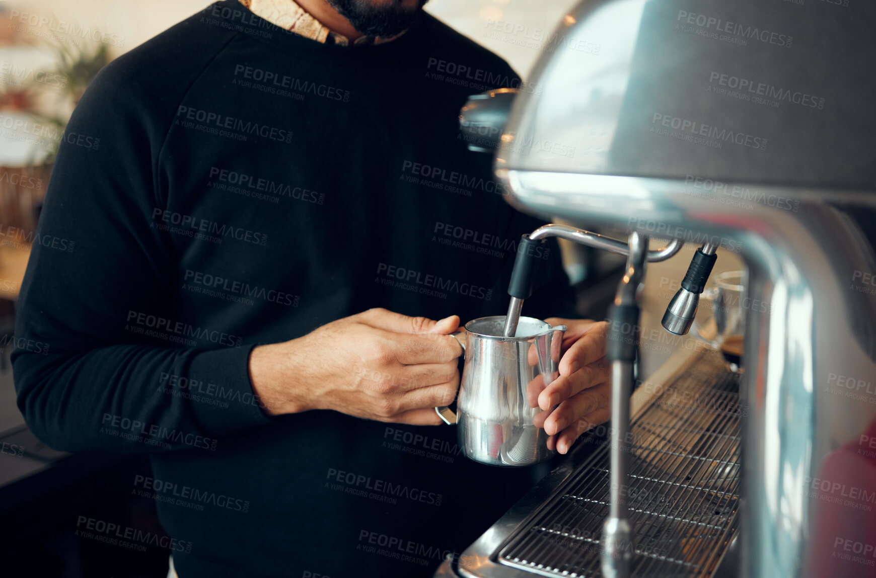 Buy stock photo Hands, man and barista brewing coffee at cafe using machine for hot beverage, caffeine or steam. Hand of employee male steaming milk in metal jug for premium grade drink or self service at shop