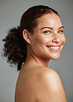 Portrait, face and skin with a model black woman in studio on a gray background for beauty or skincare. Facial, wellness and natural with an attractive young female posing to promote cosmetics