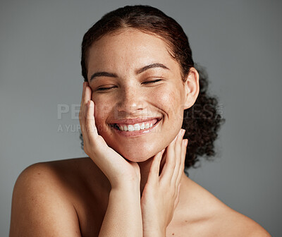 Face, beauty and satisfaction with a model black woman in studio on a gray  background to promote natural skincare. Facial, wellness and makeup with an  attractive young female happy with cosmetics |