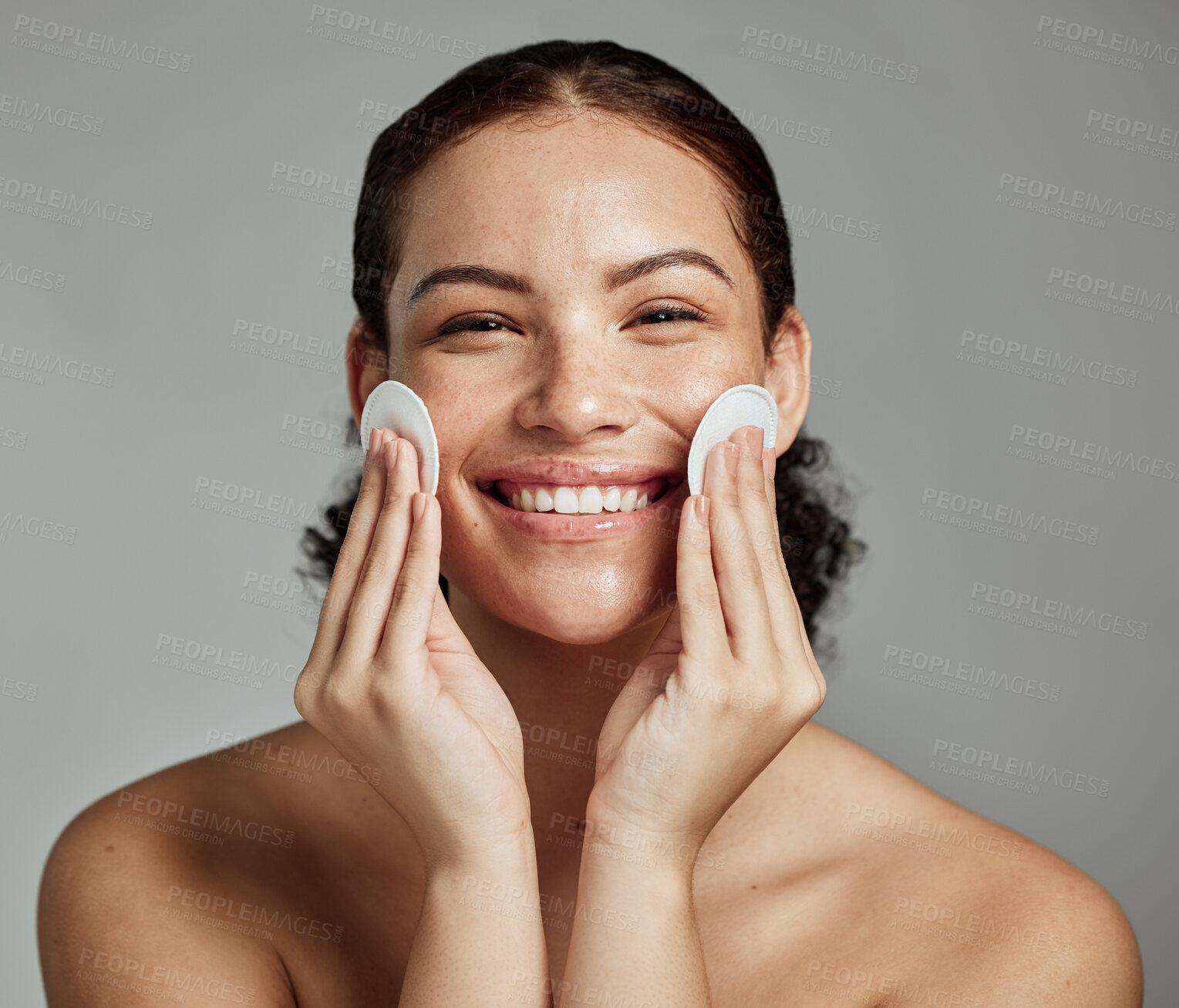 Buy stock photo Skincare, beauty and portrait of a woman with cotton for face acne, cosmetic cleaning and dermatology glow on a studio background. Cosmetics, happy and model with clean pads for facial wellness