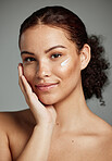 Face portrait, skincare and woman with cream in studio isolated on a gray background. Cosmetics, beauty and young female model with lotion product, creme or moisturizer for healthy skin and wellness.