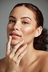 Face, sugar scrub and lips of woman in studio isolated on a gray background. Portrait, cosmetics and skincare of female model with lip dermatology product for exfoliation, cleaning and healthy skin.