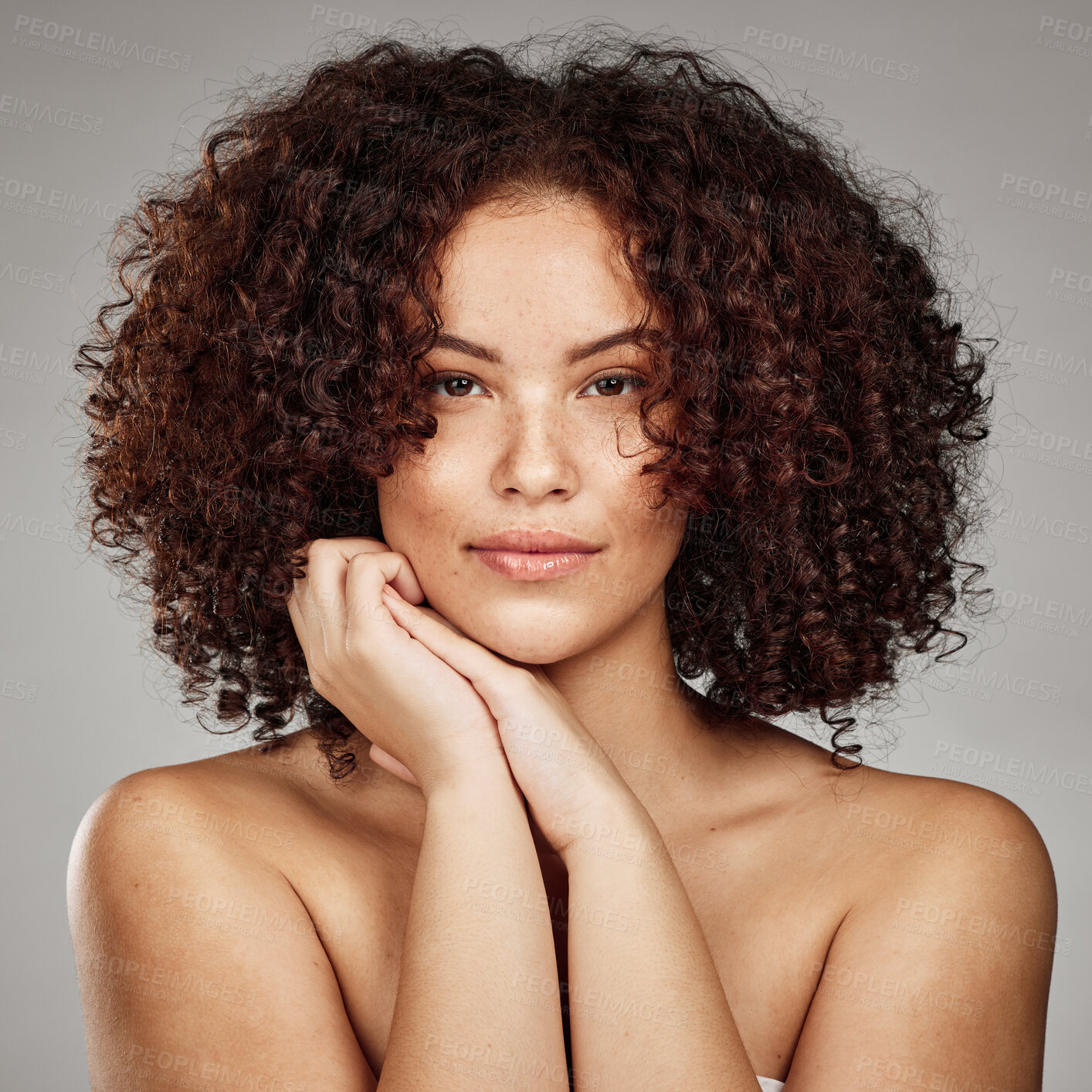 Buy stock photo Hair care, beauty and aesthetic portrait of black woman with cosmetic afro treatment campaign. Healthy body care of hair and skincare model with natural freckles on face in gray studio.

