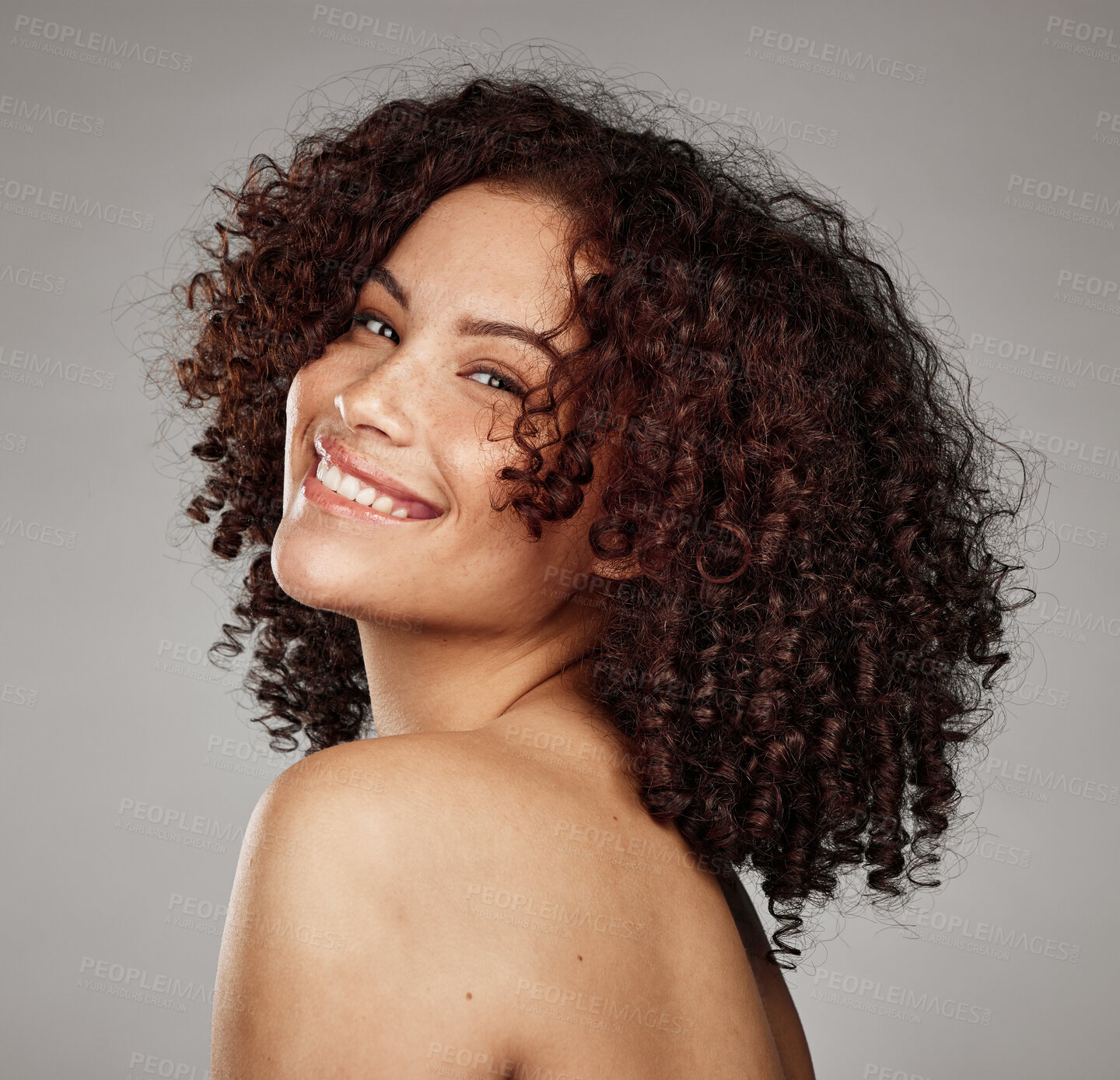 Buy stock photo Portrait, face and beauty with a model black woman in studio on a gray background for skincare treatment. Facial, wellness and natural with an attractive young female posing to promote a skin product