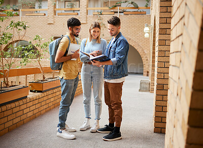 Buy stock photo University, students and friends with textbook for project study, education or sharing information together at the campus. Group of college people reading book with smile for learning or scholarship