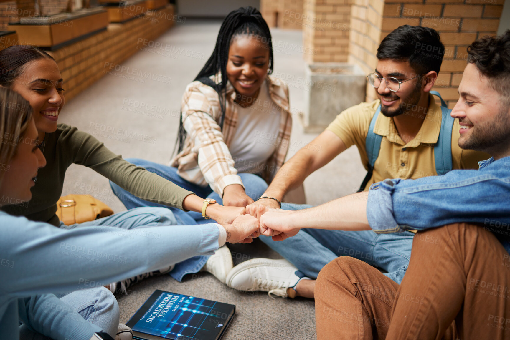 Buy stock photo Teamwork, fist bump and hands of students in university for collaboration, unity and motivation. Support, solidarity and group of people and friends huddle for education goals, learning or targets.