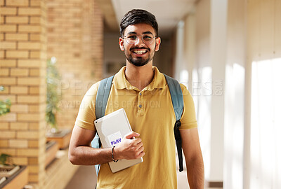 Buy stock photo Face portrait, student and man in university ready for back to school learning, goals or targets. Scholarship, education and happy, confident and proud male from India holding tablet for studying.