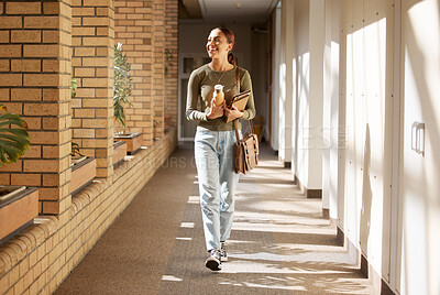 Buy stock photo Woman, student and university hallway with a person walking ready for learning and study. Smile, college and back to school happiness of a female tutor on campus going to class happy and alone