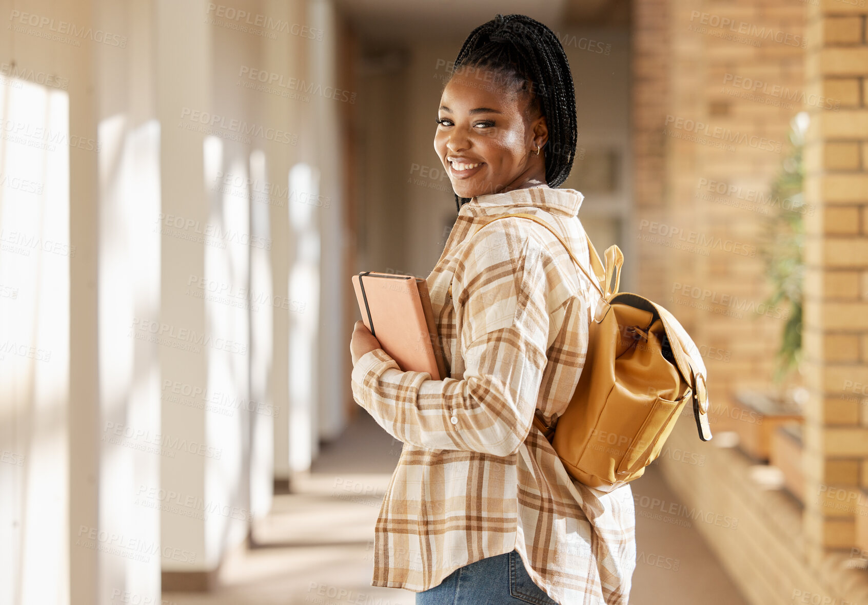 Buy stock photo College student portrait, black woman and university with books and backpack while walking at campus. Young gen z female happy about education, learning and future after studying at school building