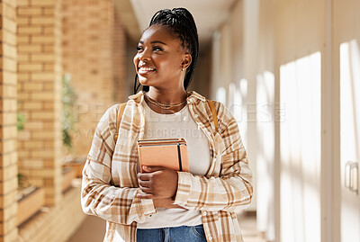 Buy stock photo Black woman, college student and thinking about future with books while walking at campus or university. Young gen z female happy about education, learning and choice to study at school building