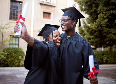 Buy stock photo Black students, hug and celebration for graduation, education and achievement on university, campus and success. African American woman, man or academics with smile, embrace or joy for college degree