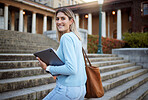 Woman, student portrait on university stairs and campus education with learning and academic goals with scholarship outdoor. Laptop, study and happy person with success, college life and studying