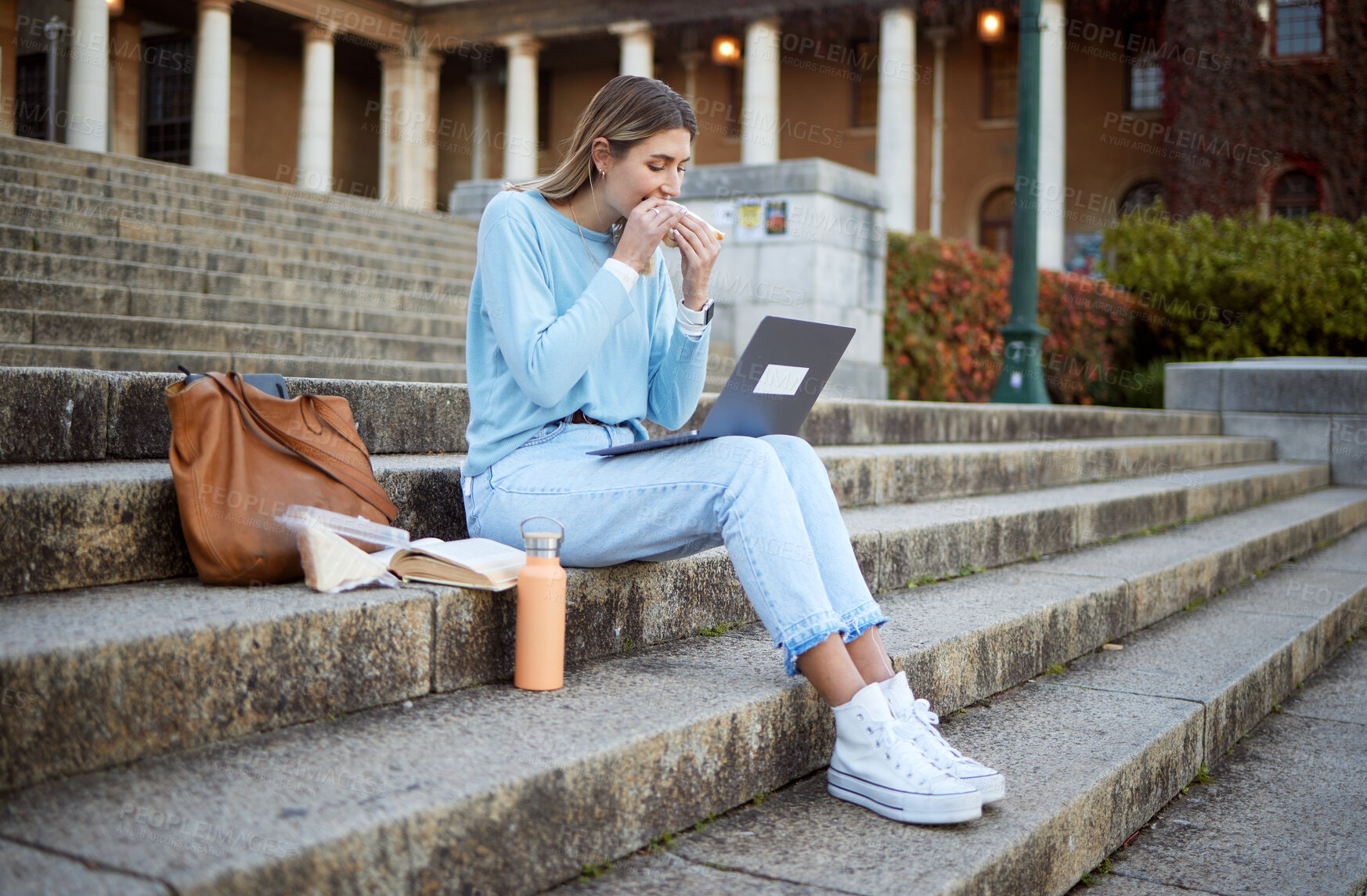 Buy stock photo College, study and food with woman and laptop for education, lunch break and academy research. University, knowledge and goal with girl student and sandwich on stairs of campus for relax and learning