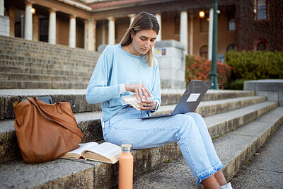 Buy stock photo College, learning and sandwich with woman and laptop for education, lunch break and academy research. University, knowledge and goal with girl student and food on stairs of campus for relax and study