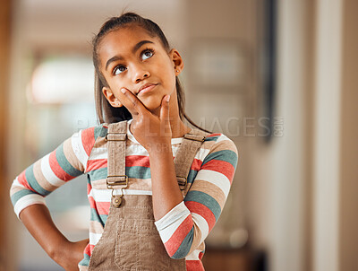 Buy stock photo Confused, thinking and idea with face of girl for question, solution and wondering. Doubt, knowledge and learning with puzzled child in concentration for thoughtful, imagine and uncertain at home