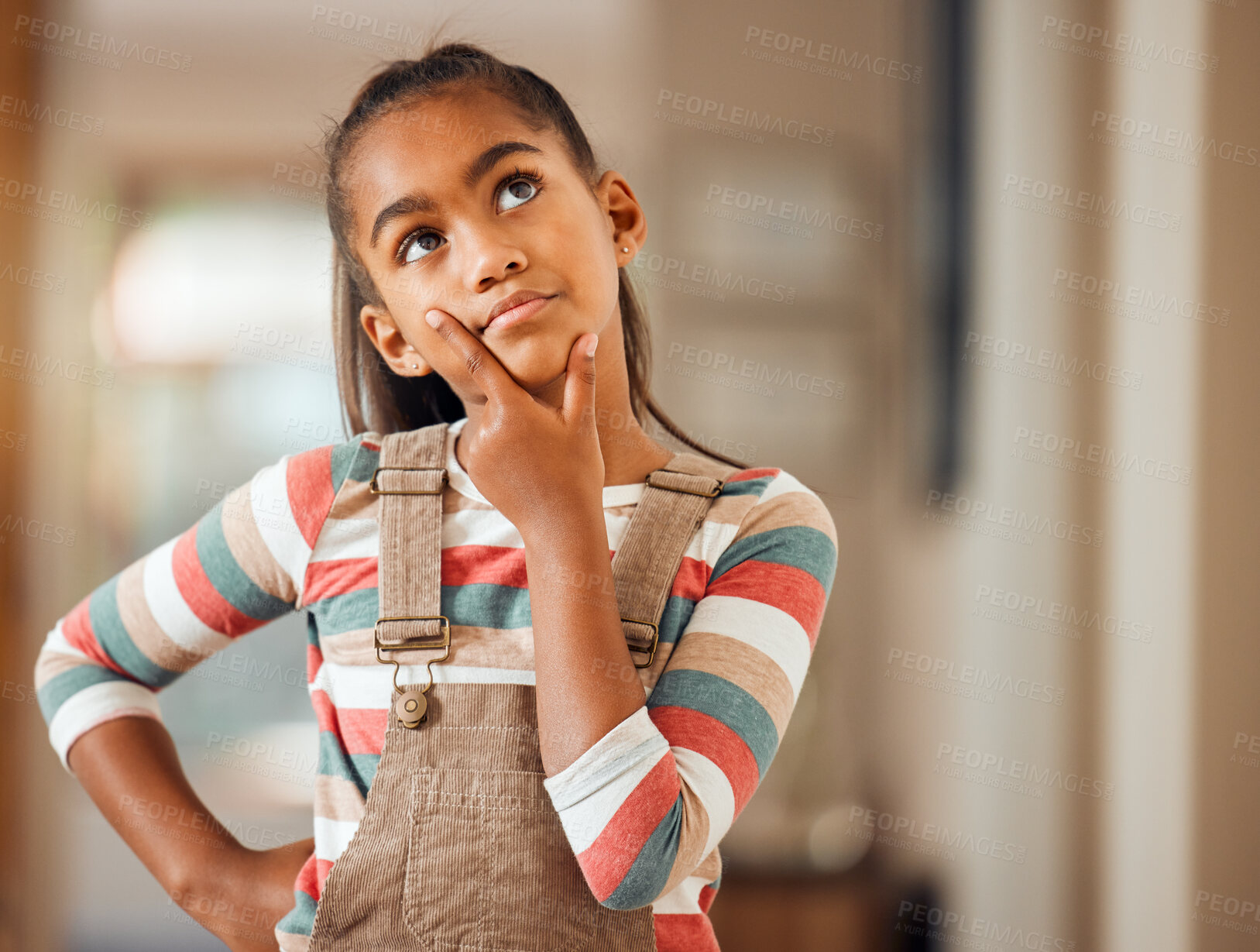 Buy stock photo Confused, thinking and idea with face of girl for question, solution and wondering. Doubt, knowledge and learning with puzzled child in concentration for thoughtful, imagine and uncertain at home