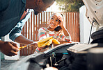 Car problem, child and dad working as a mechanic while teaching daughter to change motor oil and fix vehicle. Black man and girl kid learning, talking and bonding while busy on engine for transport 