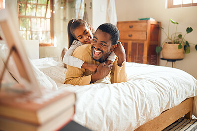 Buy stock photo Happy, playing and father and daughter in bedroom for bonding, support and affectionate. Smile, happiness and laughing with dad and child in black family home for care, quality time and playful