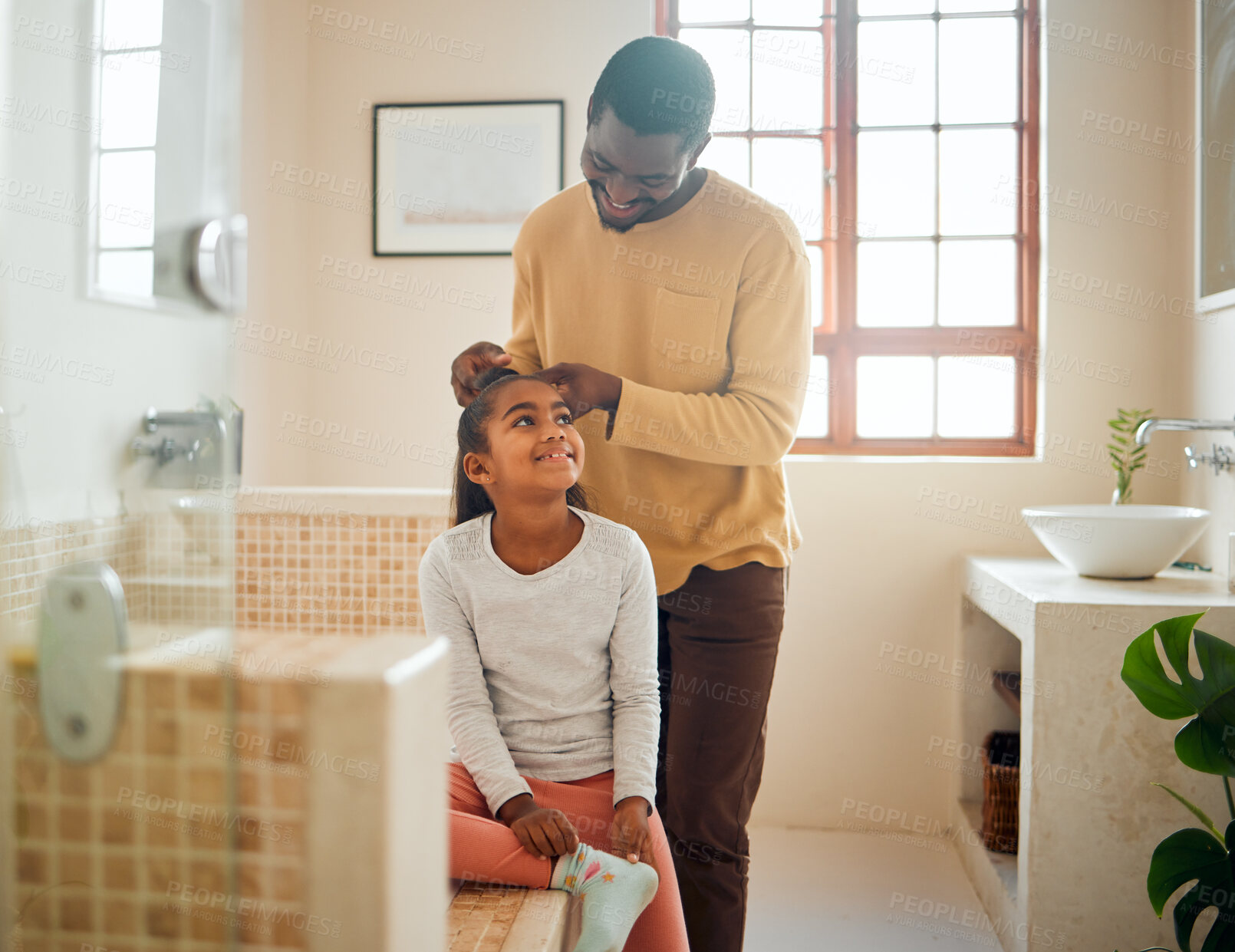 Buy stock photo Father, daughter and brushing hair in a home bathroom with love, trust and support. Man teaching child self care, health tips and wellness with communication, talking about confidence and respect