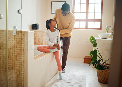 Buy stock photo Black family, father and brushing hair of girl in a home bathroom with love and support. Man teaching child self care, health tips and wellness with communication, talking about trust and respect
